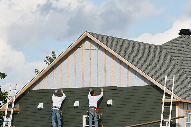 Professional Siding Replacement technician working in Center Cross, VA